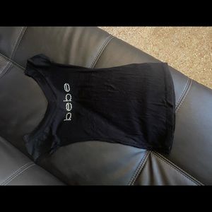 Bebe off shoulder or on shoulder shirt